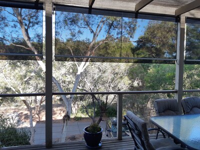 Holiday house nestled in native bush land overlooking wetlands