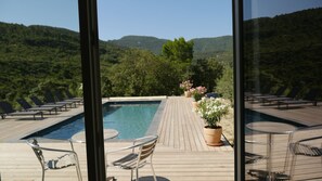 view of the pool from the living room