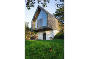 Looking from the south-west toward the full glass front window.