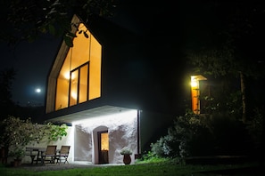 Looking from southwest toward the house by night.