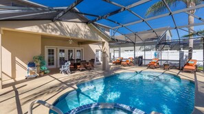 A sparkling pool with a luxurious spa in sunny Florida.