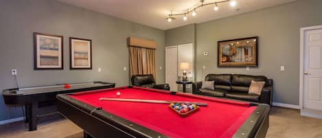 Challenge friends to pool in our spacious game room.