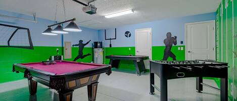 Unleash your competitive spirit in our ultimate game room.