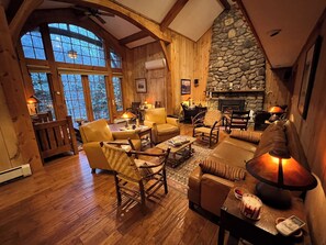 The Great Room has numerous areas to gather, read, & engage w/ family & friends.