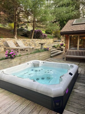 Soothe your muscles & soul on the private back deck w/ lovely views.