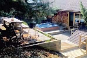 The Back Deck w/ hot tub, picnic area. It's great for moon, star & tree gazing 