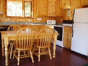Kitchen is fully equipped with cooking/serving dishes. Extra seating available.