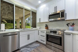 Fully equipped kitchen with huge pass thru window