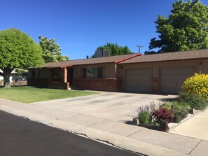 Double parking in front driveway with access to one garage bay. 