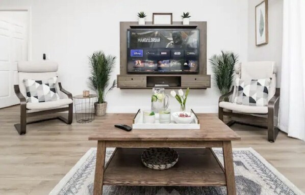65" Smart TV equipped with FireTV for worldwide Sports and programming.