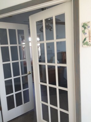 French doors to the primary bedroom 