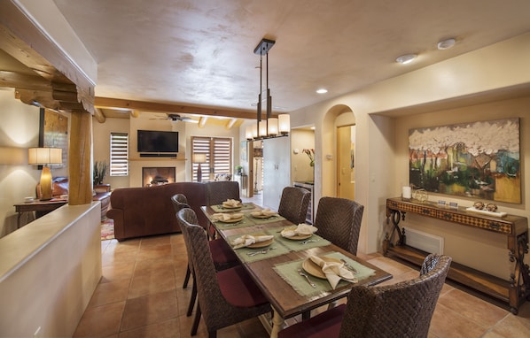 Spacious living and dining area with direct access to patio courtyard