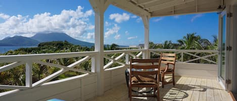 2nd floor balcony with views over the coconut palm trees, ocean view to Nevis!