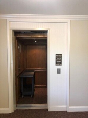 Elevator with cart