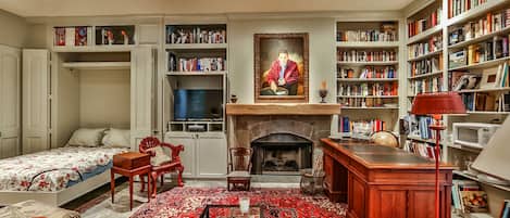 panorama of living room, working fireplace, antique desk, Queensize Murphy Bed