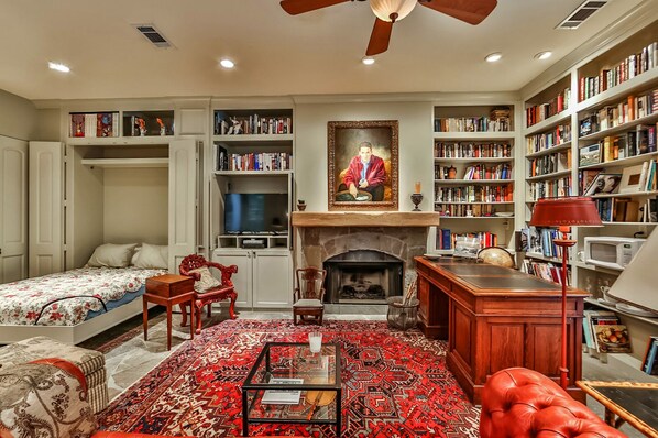 panorama of living room, working fireplace, antique desk, Queensize Murphy Bed