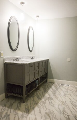 Lower Master Double Vanity.  Mirrors restored from older home.