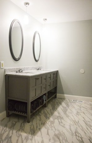 Lower Master Double Vanity.  Mirrors restored from older home.