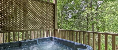 Relaxing hot tub on covered deck