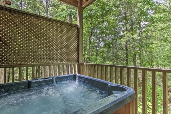 Relaxing hot tub on covered deck