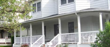 The Front Porch with wicker chairs is a quiet place to sit and visit.