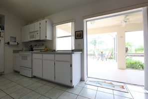 Kitchen and Dining Area Open to Lanai/Pool