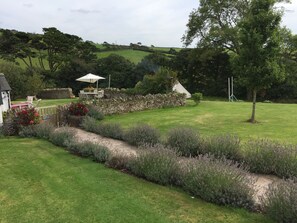 Pathway leading to garden and house