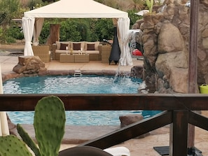 salt water pool with waterfall.