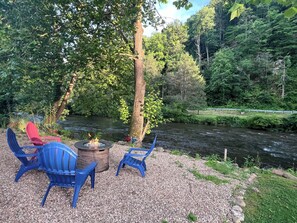 Propane Fire Pit in the backyard overlooking the river. 