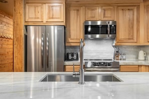 Kitchen with new counters and appliances