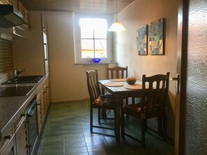 Kitchen with dining table for three