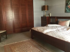 Bedroom with large wardrobe.