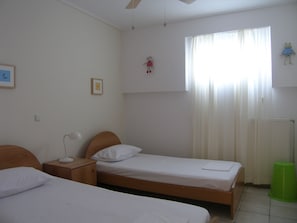 Second bedroom with 2 large single beds