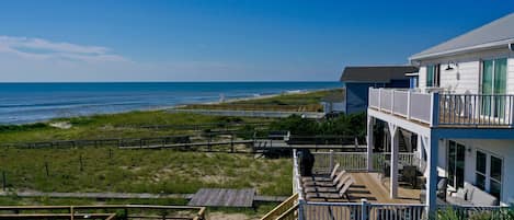 The ocean is only steps away via your private walkway at this amazing house!