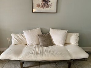 Small fold down couch  (sheets provided)