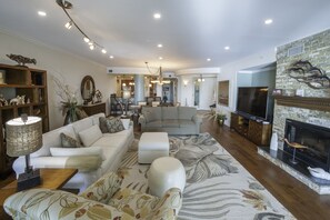 Living Room with ample space for connecting with family and friends.