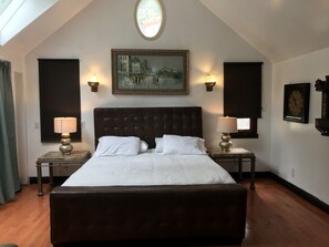 Vaulted
Ceiling bedroom in castle 
King bed 