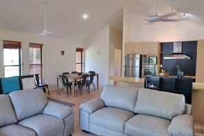 5 O'clock - Wongaling Beach - TV area to kitchen - dining are