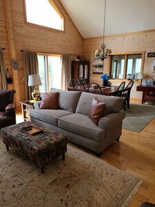Great Room with Dining Rm table open to the kitchen. Loft overlooks Great Rm.