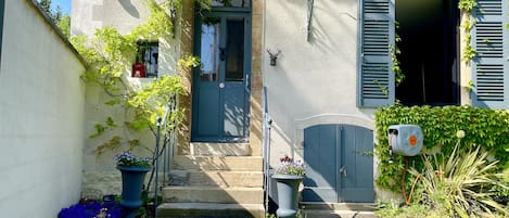 Entrance with pretty flowers 