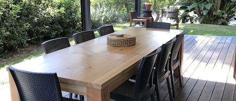 Undercover outdoor area with weatherproof blinds and heating. 