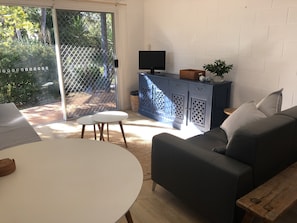 Living area with afternoon sun streaming in 