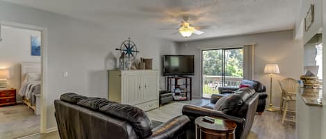 Beautifully Decorated Living Area with Flat Screen TV