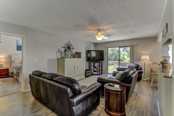 Beautifully Decorated Living Area with Flat Screen TV