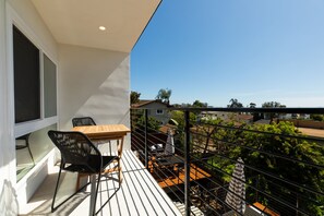 Unit 1 (upstairs) - Patio area from living room.