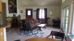 Living room w/ shuffleboard