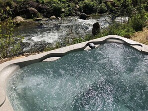 Hot tub with a gorgeous water view!