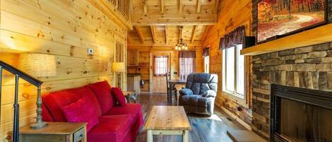 Huge ceilings and gorgeous hardwoods throughout the beautiful cabin!