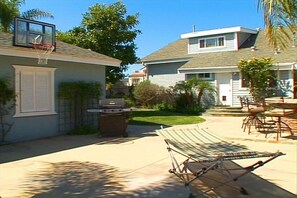 One of the largest yards in town with a grill and sport court.