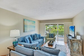 Living room with access to screened lanai